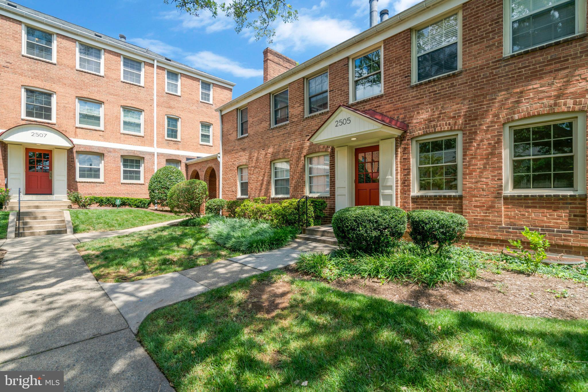 2505 Arlington Boulevard, Unit 102 Arlington, VA 22201 - Photo 2 of 26 a front view of a house with garden and porch