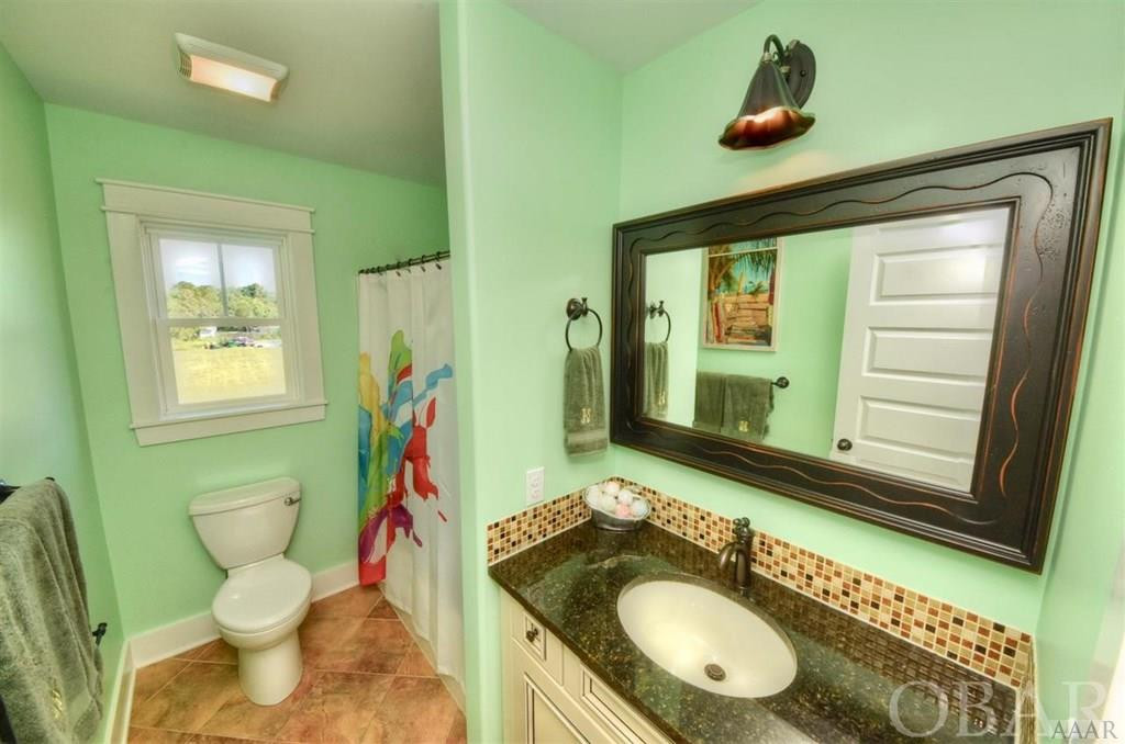 1231 Waterlily Road Coinjock, NC 27923 - Photo 26 of 36 Shared Hall Bath