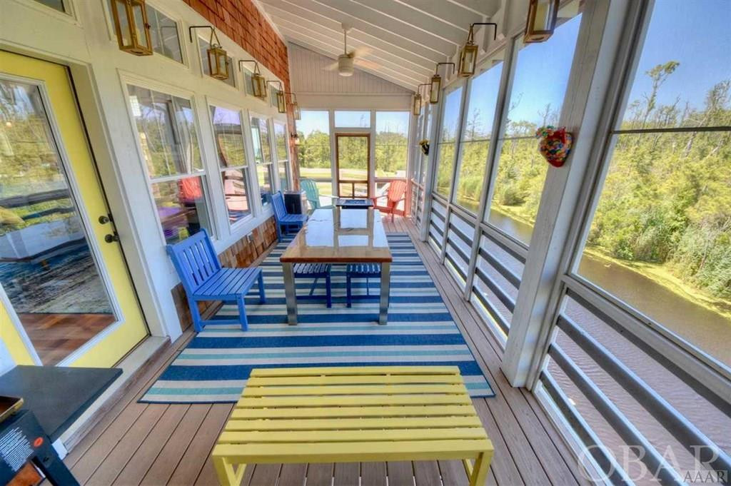 1231 Waterlily Road Coinjock, NC 27923 - Photo 9 of 36 Huge Screen Porch