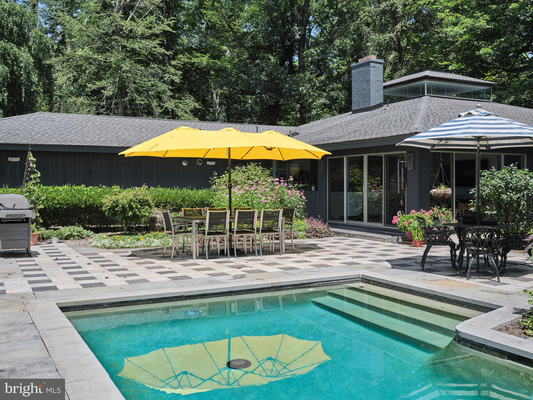 35 Raven Rock Rosemont Road Stockton, NJ 08559 - Photo 47 of 61 a swimming pool with patio outdoor seating and yard