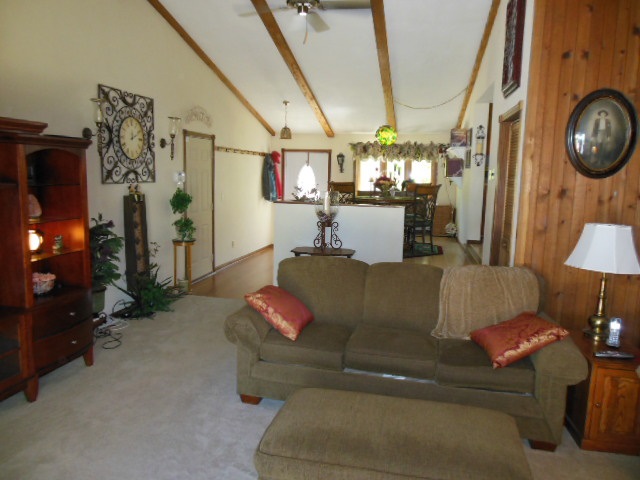 3918 Abbotsford Road Rockford, IL 61107 - Photo 13 of 25 a living room with furniture and a fireplace