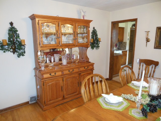 3918 Abbotsford Road Rockford, IL 61107 - Photo 6 of 25 view of a dining room with furniture window and wooden floor