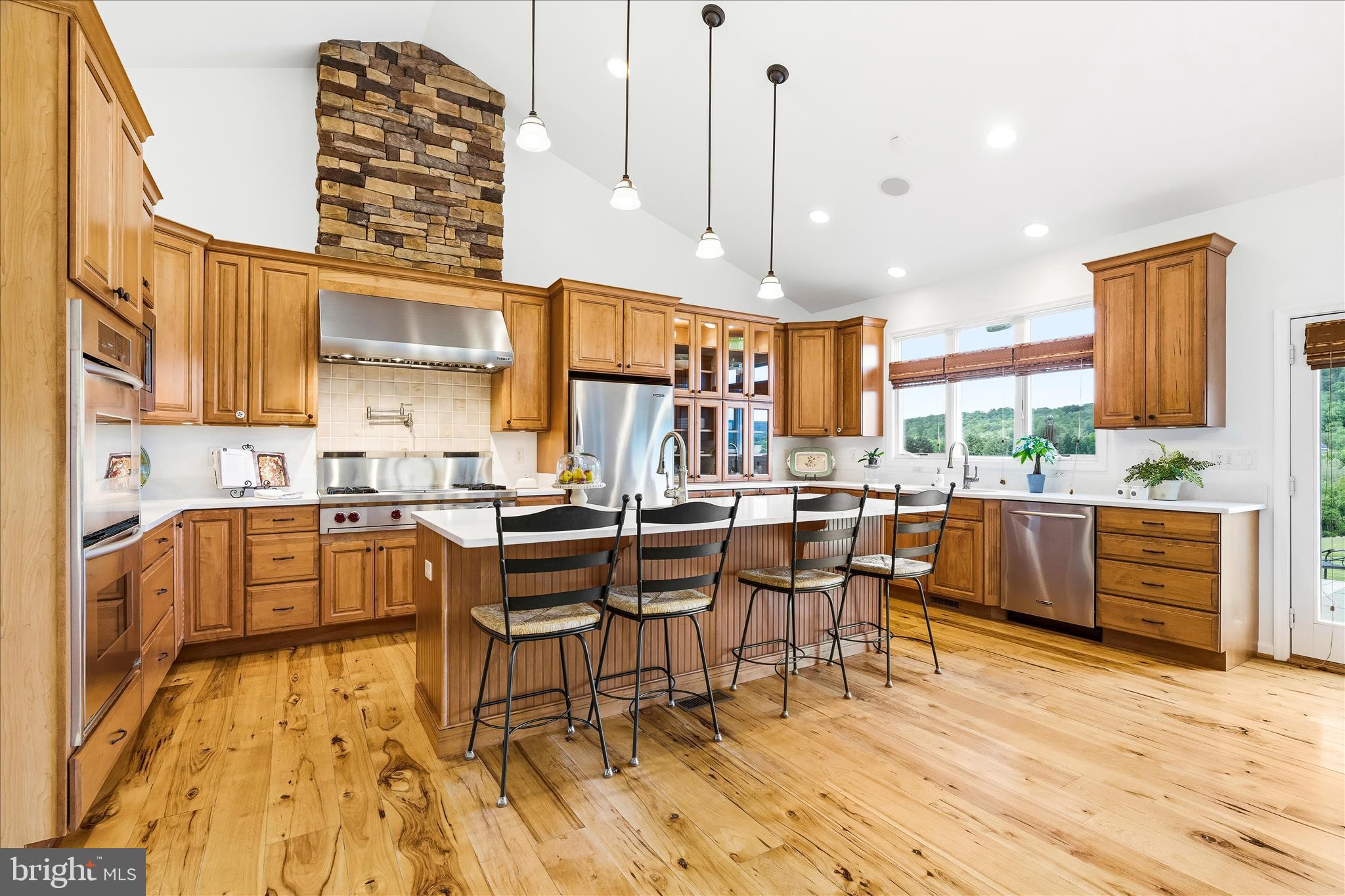 10691 Easterday Road Myersville, MD 21773 - Photo 17 of 79 a large kitchen with a table and chairs