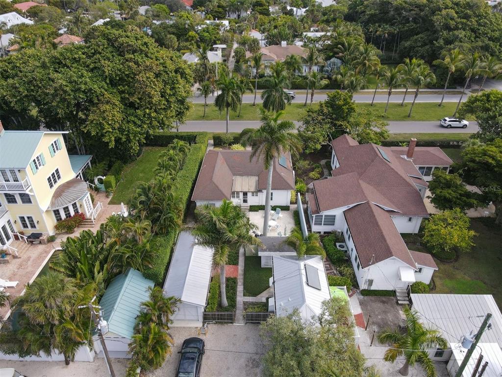 241 Gilchrist Avenue, Unit C Boca Grande, FL 33921 - Photo 3 of 23 an aerial view of multiple houses with yard