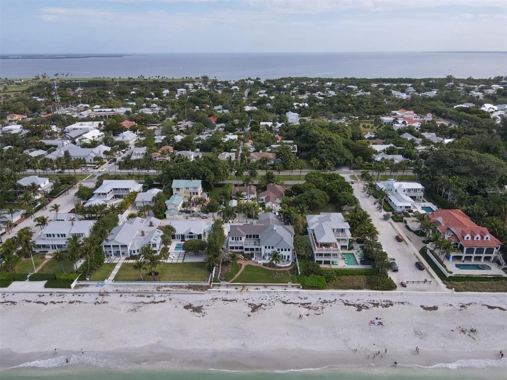 241 Gilchrist Avenue, Unit C Boca Grande, FL 33921 - Photo 5 of 23 an aerial view of residential houses with outdoor space
