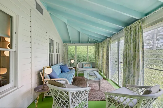 a outdoor living space with furniture and garden view