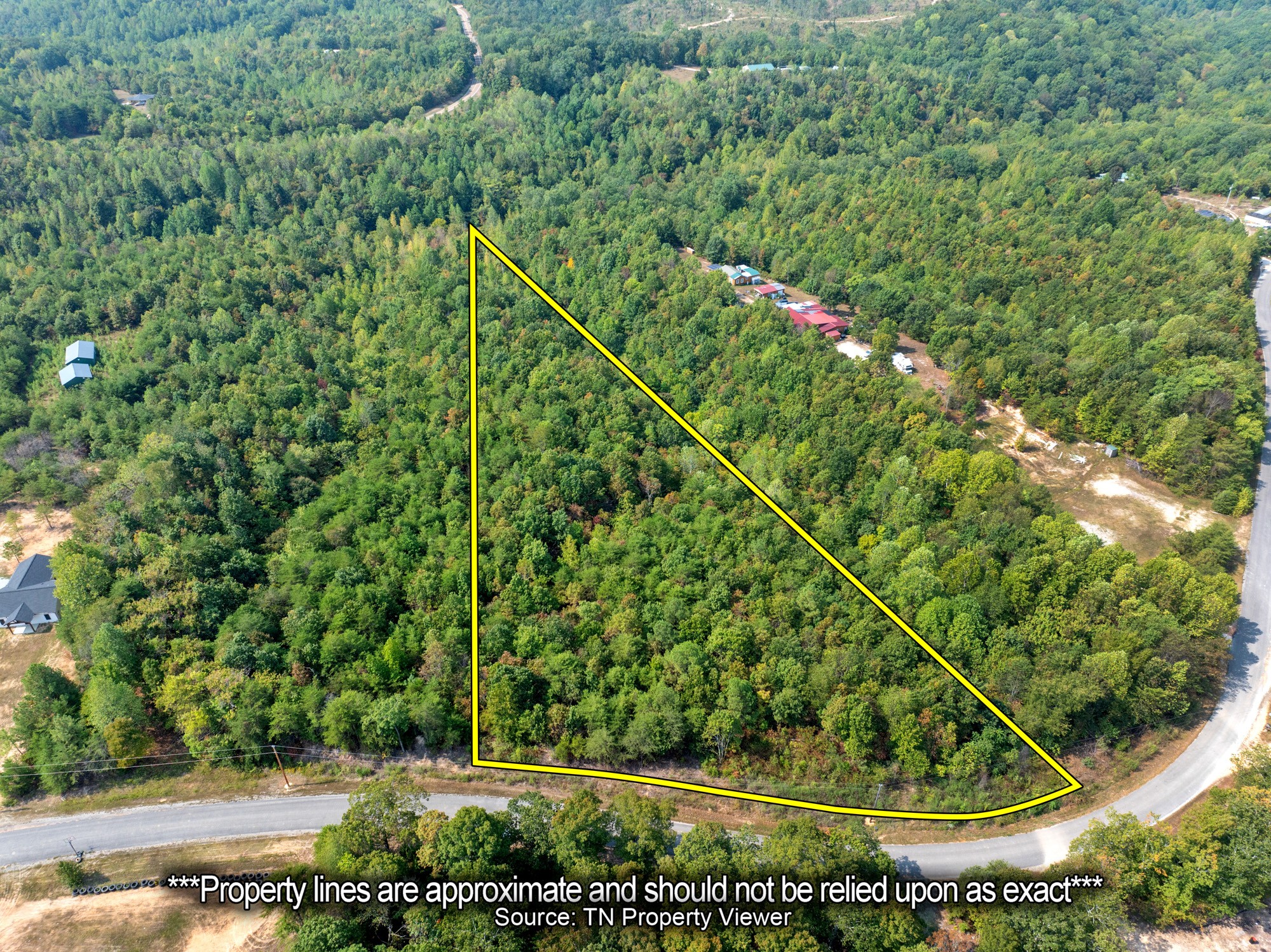 0 New Era Ridge Road Linden, TN 37096 - Photo 1 of 20 a view of a yard with a tree