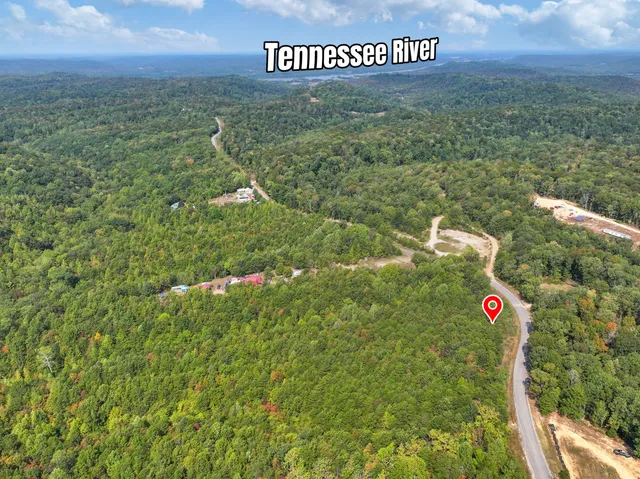 a sign that is sitting in the middle of a field