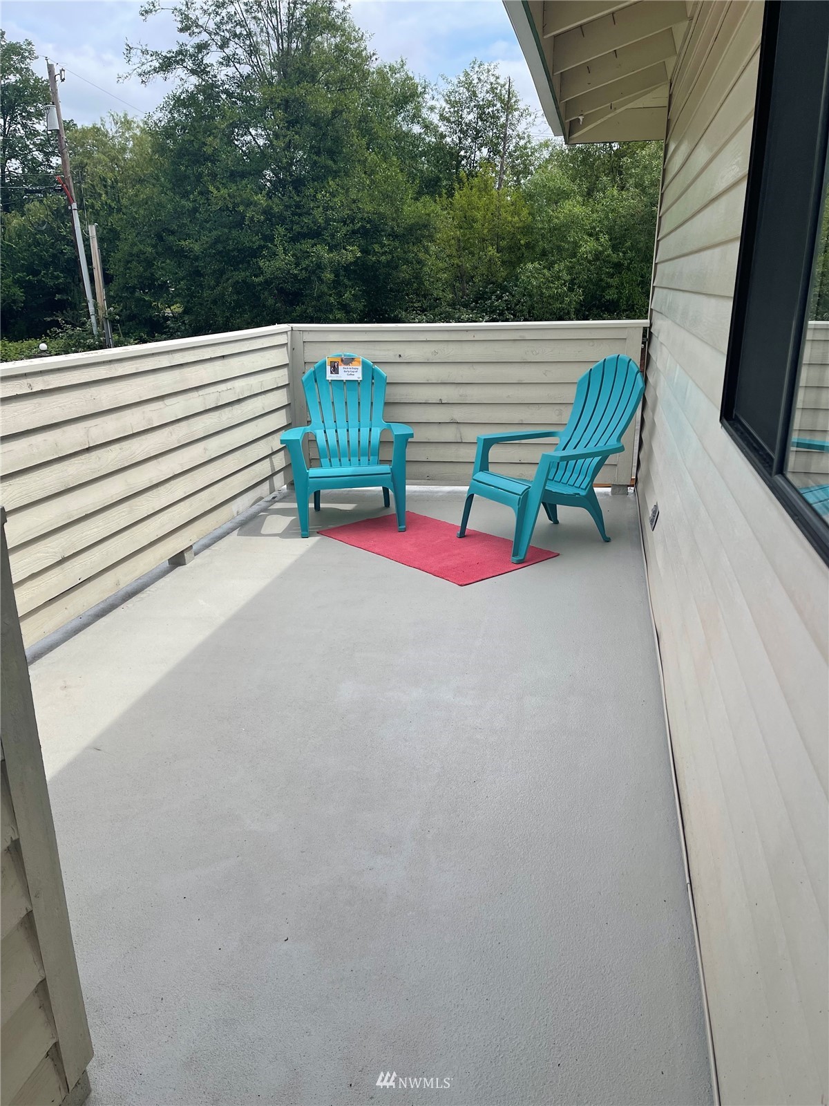 1806 201st Place Southeast, Unit 1D Bothell, WA 98012 - Photo 18 of 20 a view of a two chairs in a roof deck