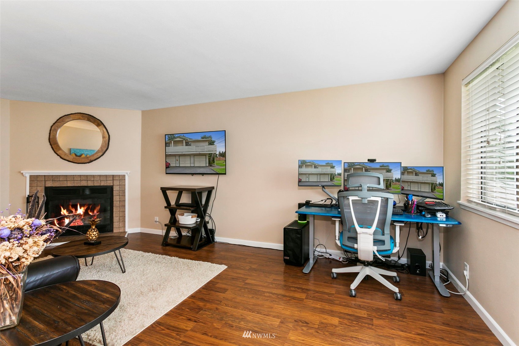 1806 201st Place Southeast, Unit 1D Bothell, WA 98012 - Photo 7 of 20 a view of a livingroom with furniture and a fireplace
