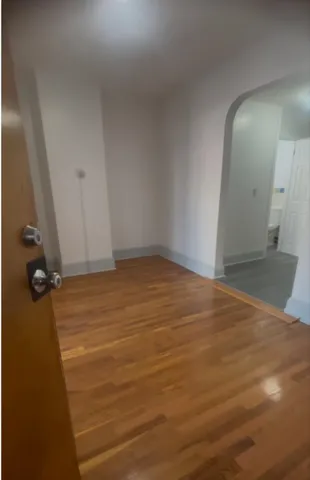 a bathroom with a sink a shower and a mirror