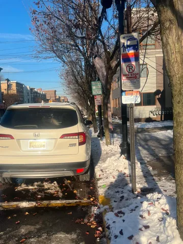 a view of a street with cars