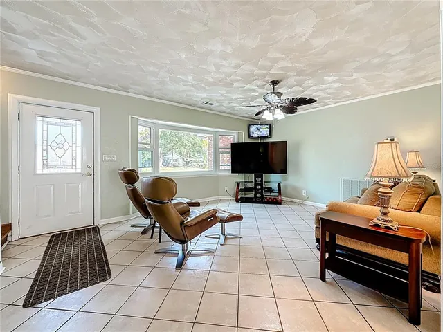 a kitchen with granite countertop white cabinets white appliances with a sink and dishwasher
