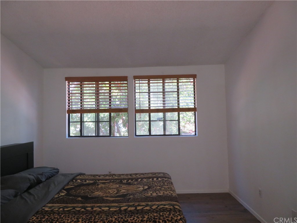 8167 Vineyard Avenue, Unit 66 Rancho Cucamonga, CA 91730 - Photo 16 of 16 a living room with a couch