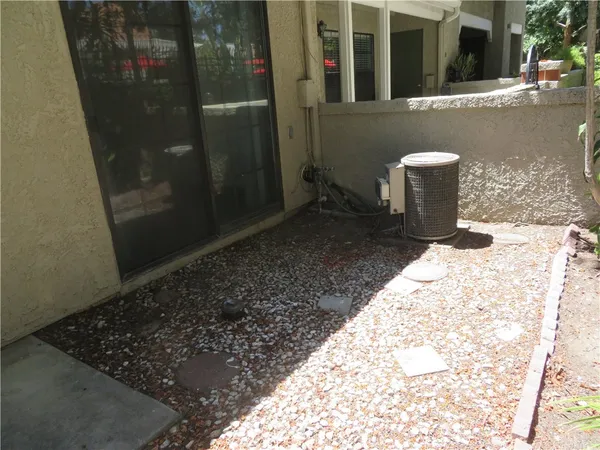 a view of a balcony with door