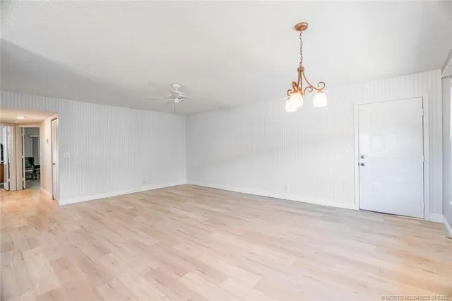 a view of empty room with a sink