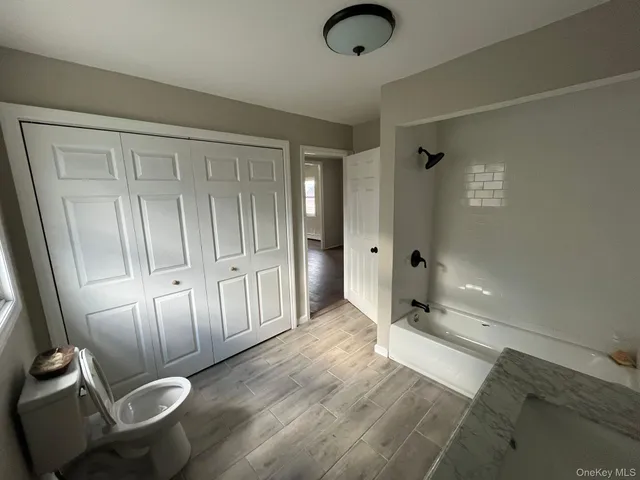 a view of livingroom with furniture and wooden floor