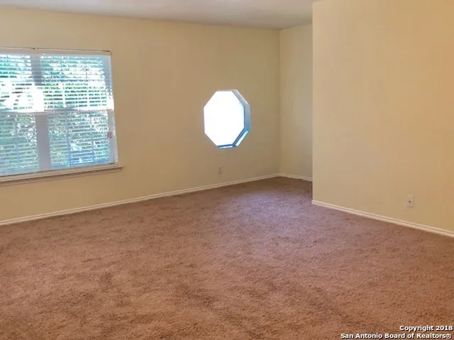 an empty room with a window