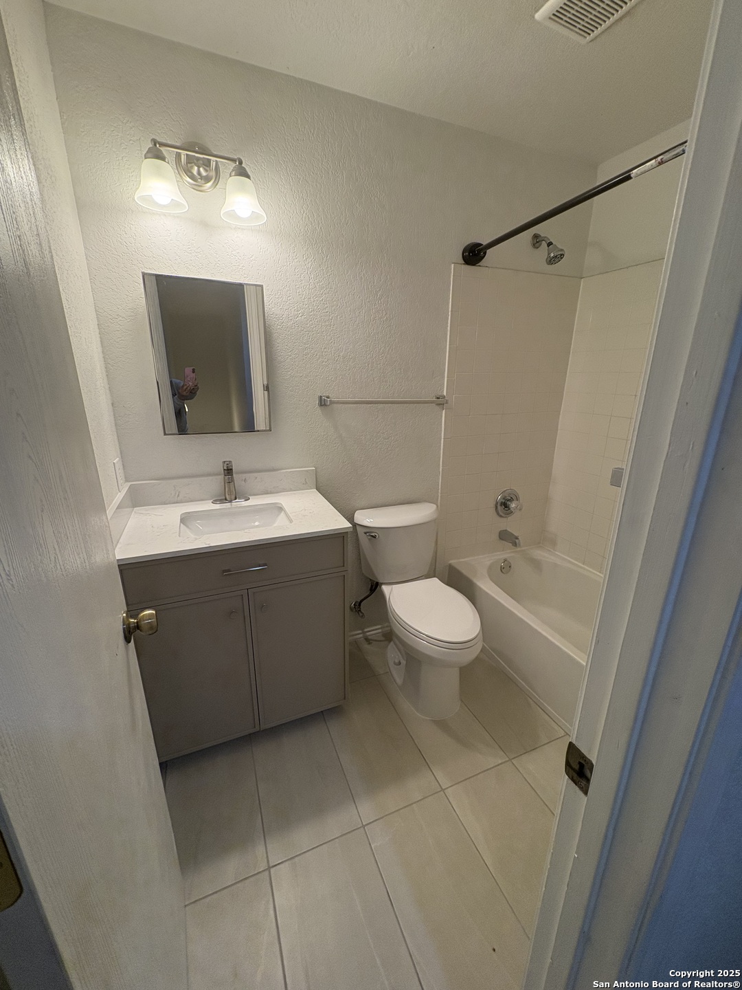 10134 Ranger Canyon San Antonio, TX 78251 - Photo 20 of 22 a bathroom with a sink a toilet and shower
