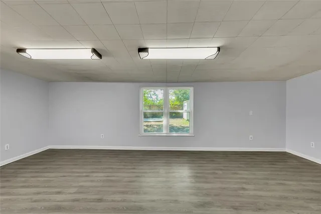 a view of room and wooden floor