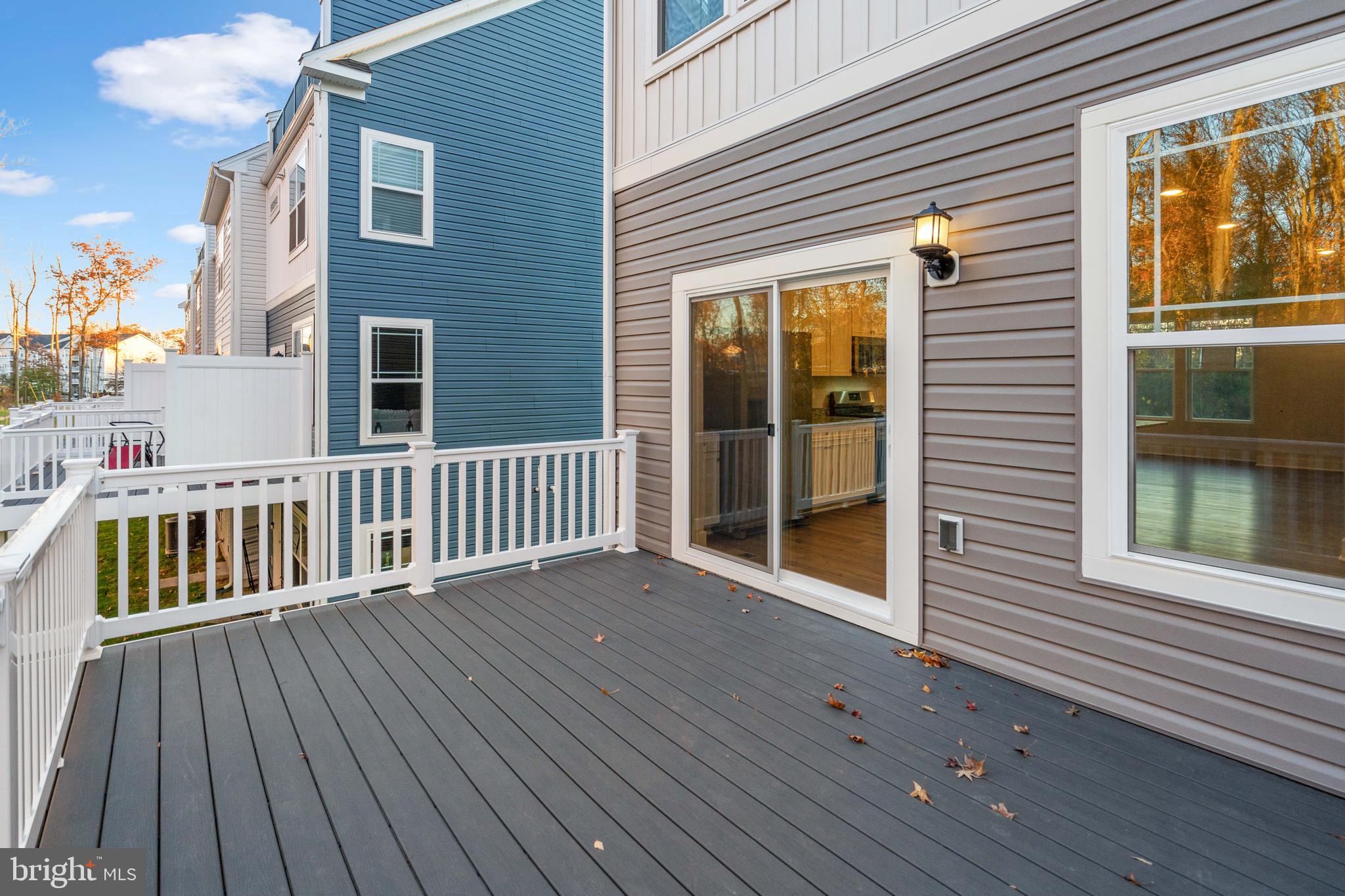 252 Waterstone Road Essex, MD 21221 - Photo 33 of 35 a view of a house with wooden deck