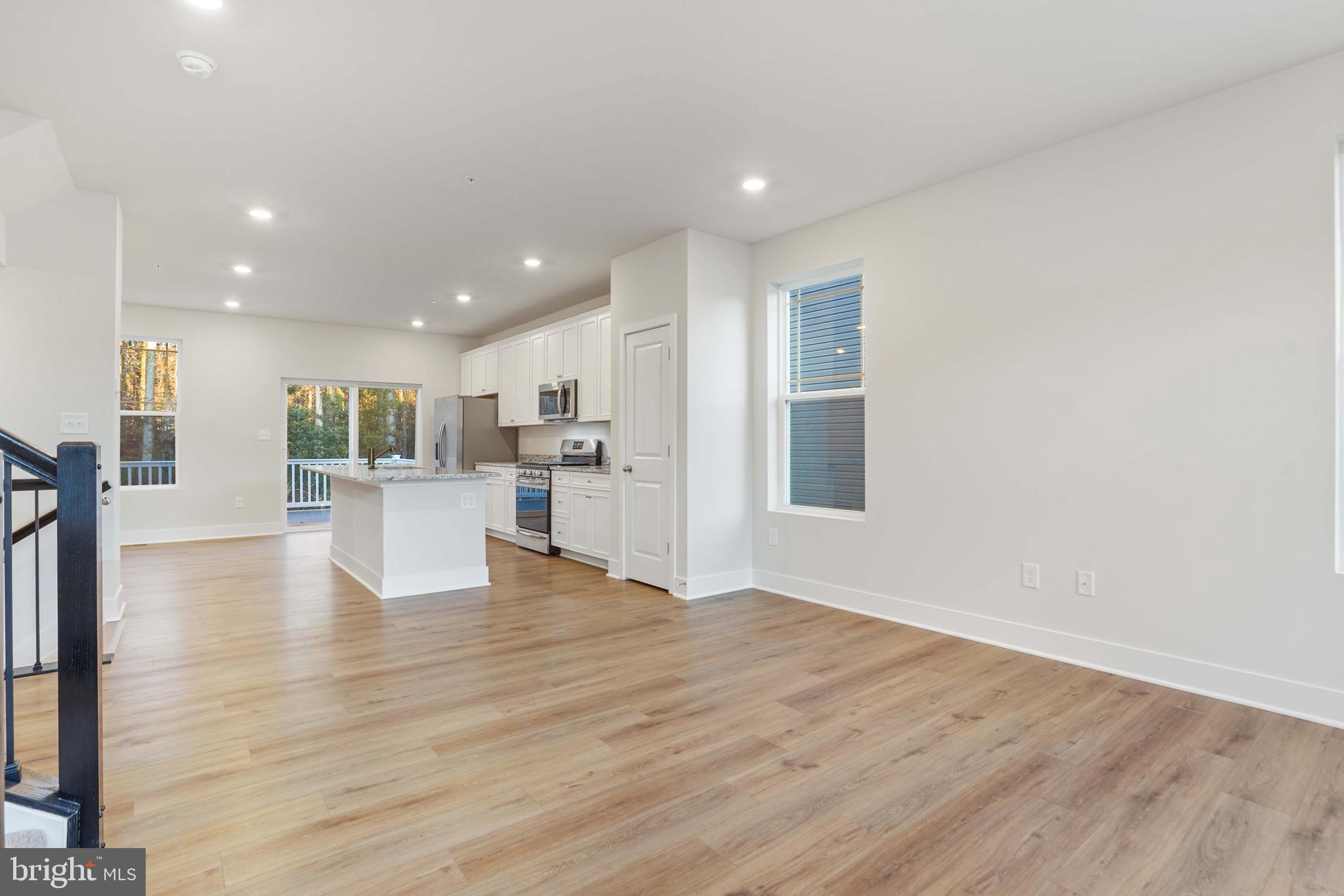 252 Waterstone Road Essex, MD 21221 - Photo 5 of 35 a view of kitchen with wooden floor