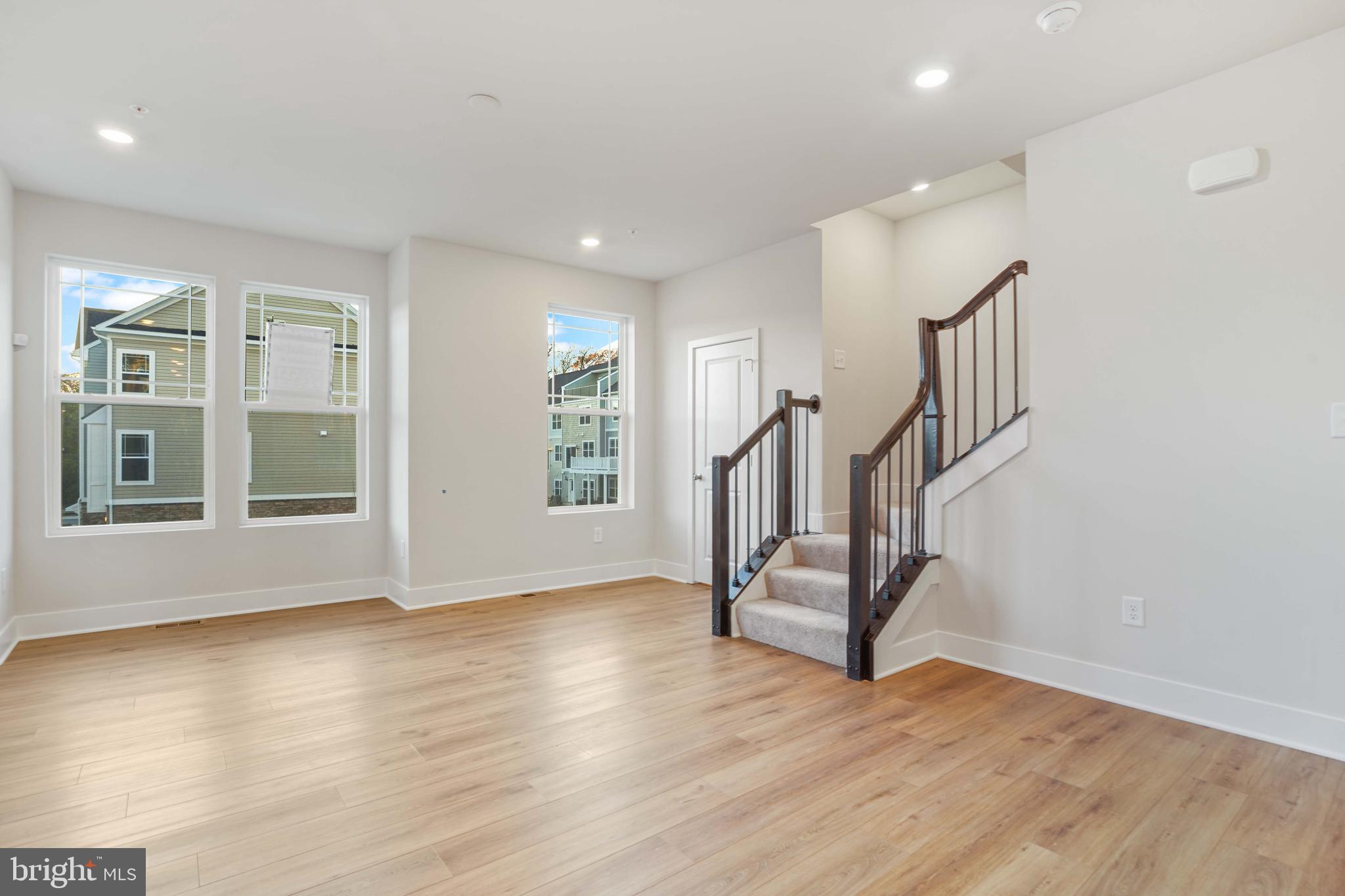 252 Waterstone Road Essex, MD 21221 - Photo 6 of 35 a view of an entryway with wooden floor and windows