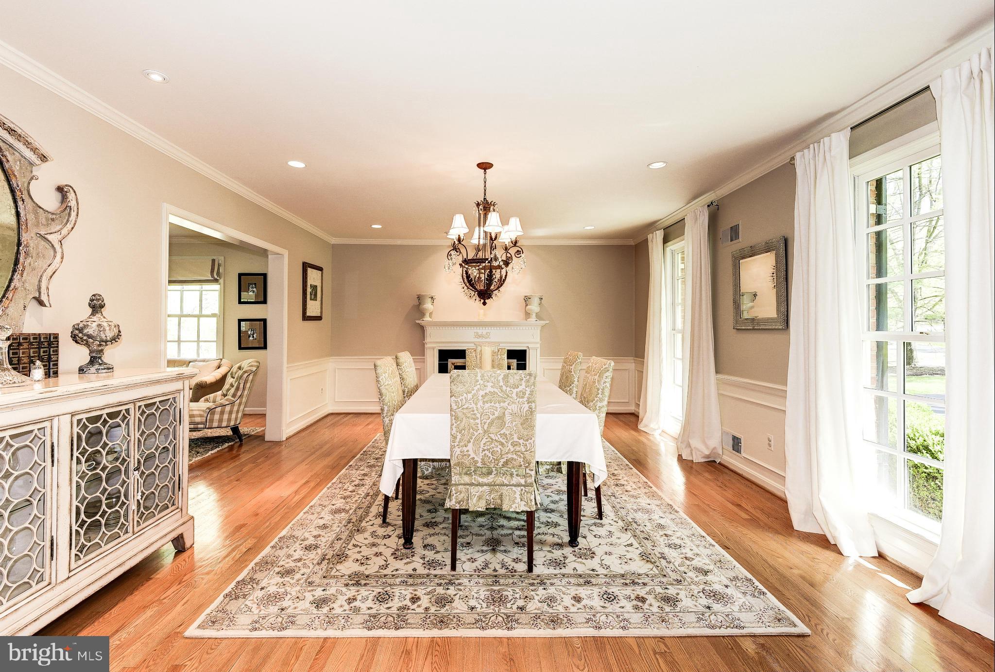 11109 Cripplegate Road Potomac, MD 20854 - Photo 2 of 31 a view of a a dining room with furniture window and wooden floor