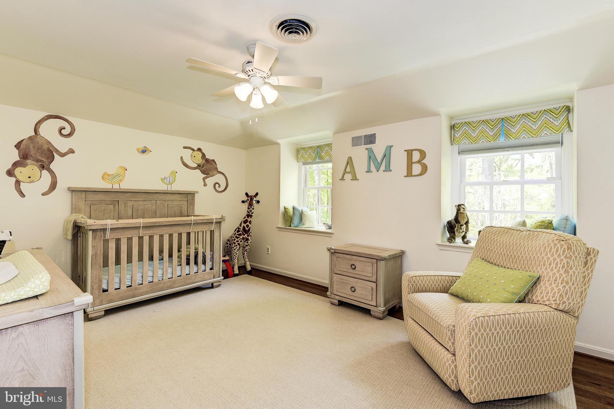 11109 Cripplegate Road Potomac, MD 20854 - Photo 16 of 31 a bedroom with furniture and a window