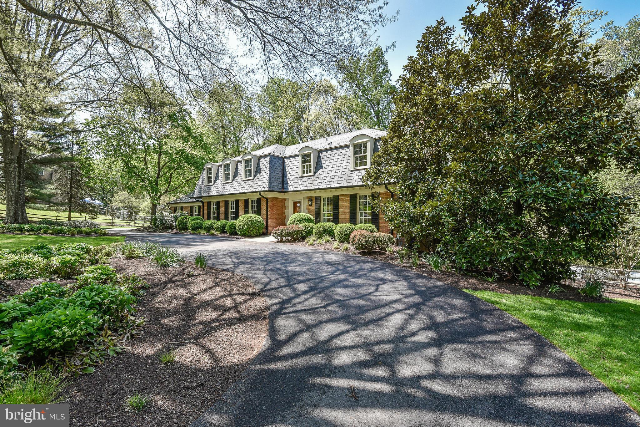 11109 Cripplegate Road Potomac, MD 20854 - Photo 17 of 31 a front view of a house with a yard