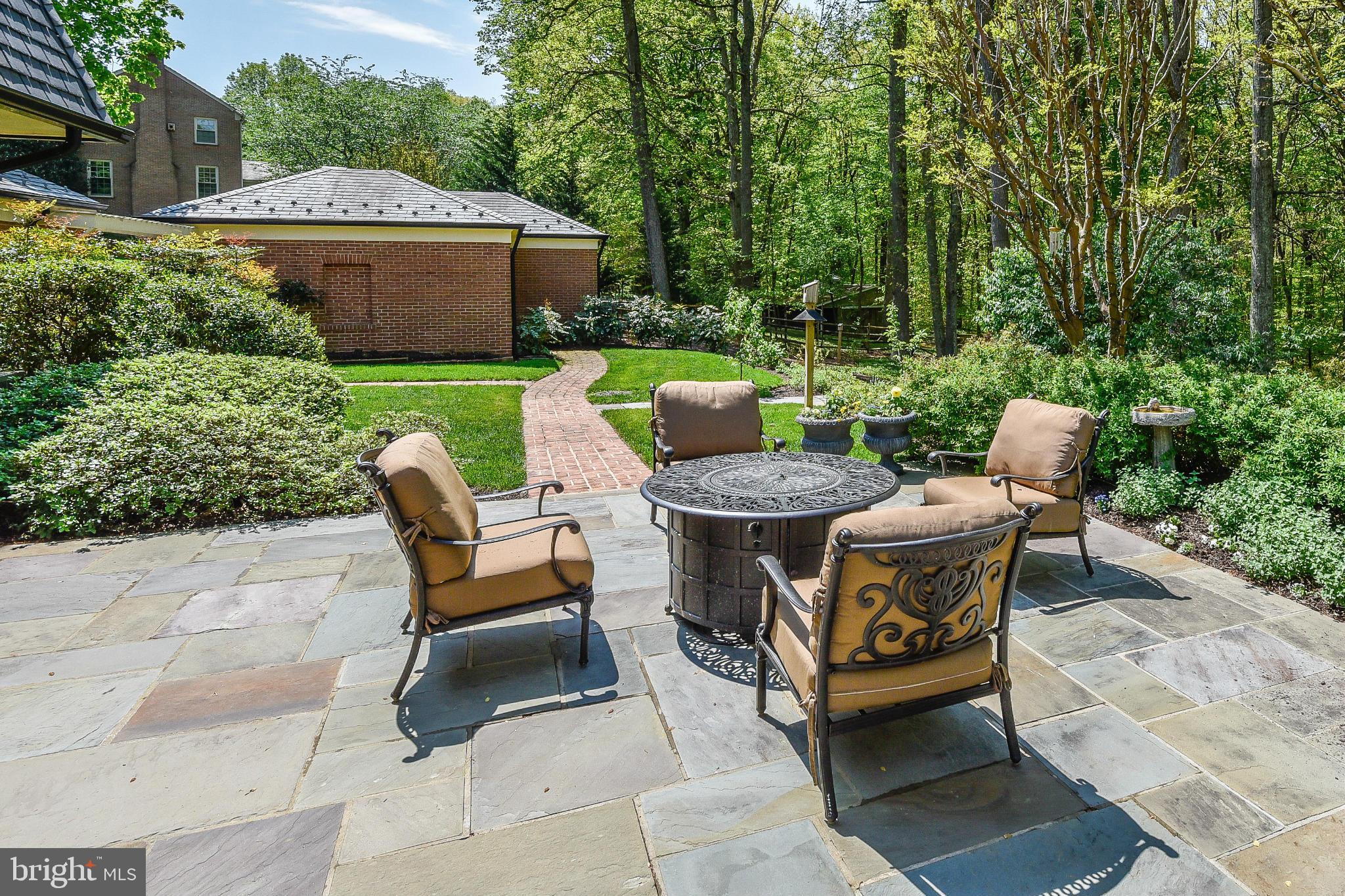 11109 Cripplegate Road Potomac, MD 20854 - Photo 29 of 31 a view of backyard with seating space and green space