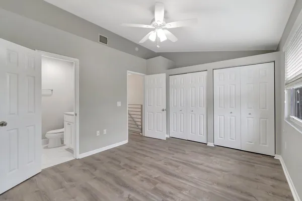 a view of a bathroom with a glass door and shower