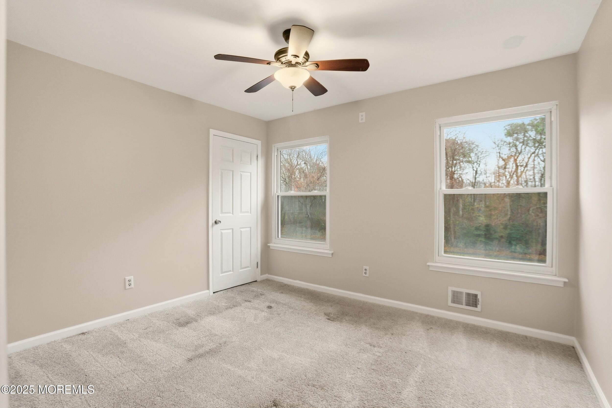 556 Kirk Lane Brick, NJ 08724 - Photo 12 of 15 a view of an empty room with a window