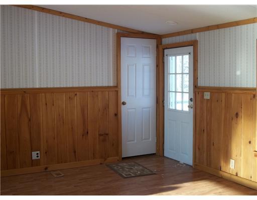 297 New Portland Road North Anson, ME 04958 - Photo 3 of 13 Living Room. Bright and sunny