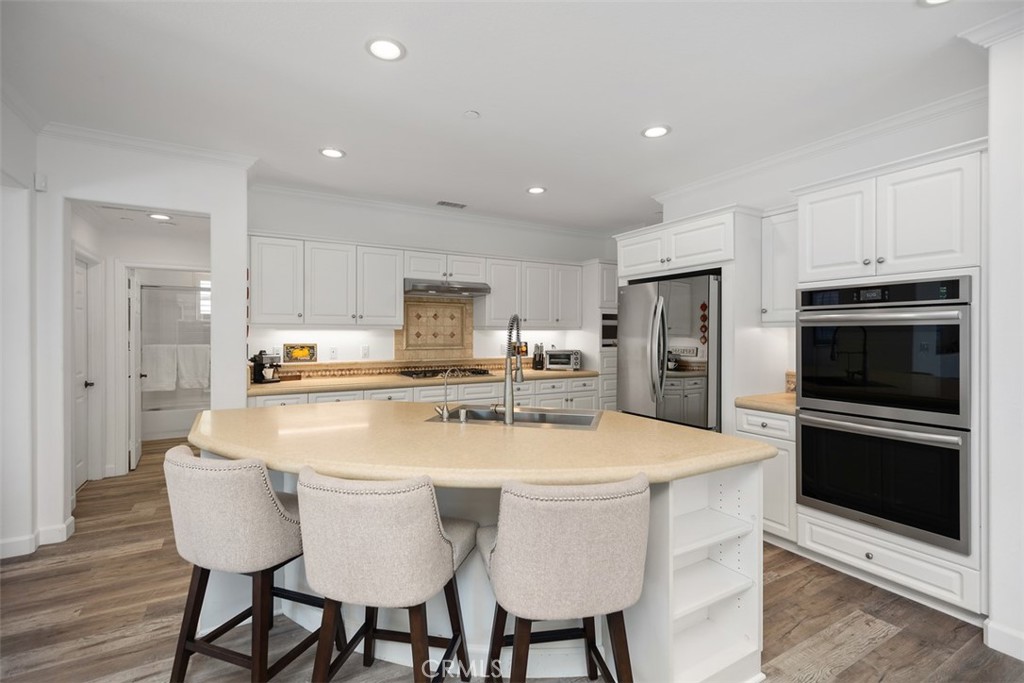 2 Via Paquete San Clemente, CA 92673 - Photo 18 of 44 a large kitchen with a table and chairs