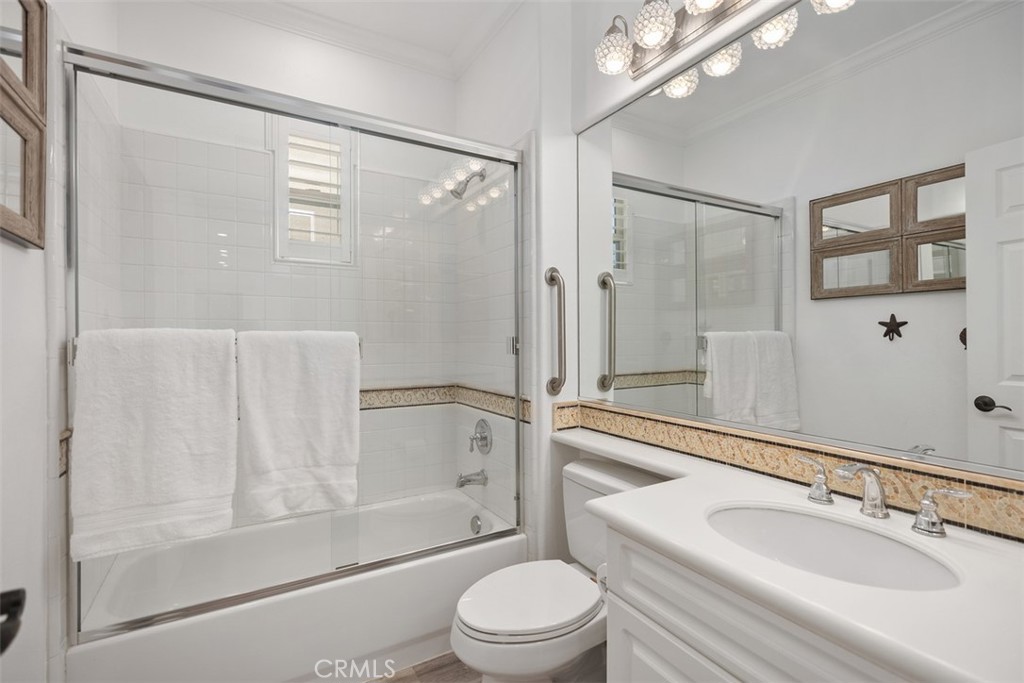 2 Via Paquete San Clemente, CA 92673 - Photo 24 of 44 a bathroom with a granite countertop sink toilet and shower