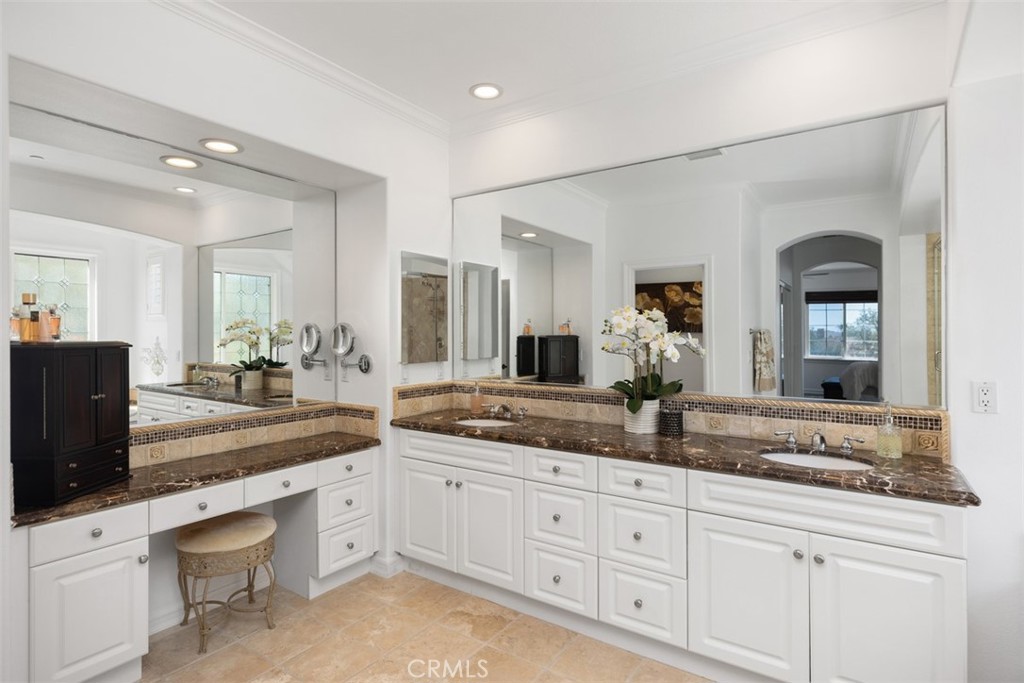 2 Via Paquete San Clemente, CA 92673 - Photo 30 of 44 a spacious bathroom with a granite countertop sink a mirror and a