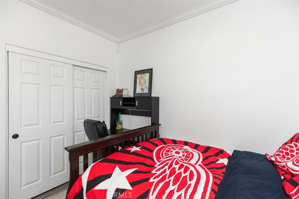 2 Via Paquete San Clemente, CA 92673 - Photo 35 of 44 a bedroom with a bed and a chair