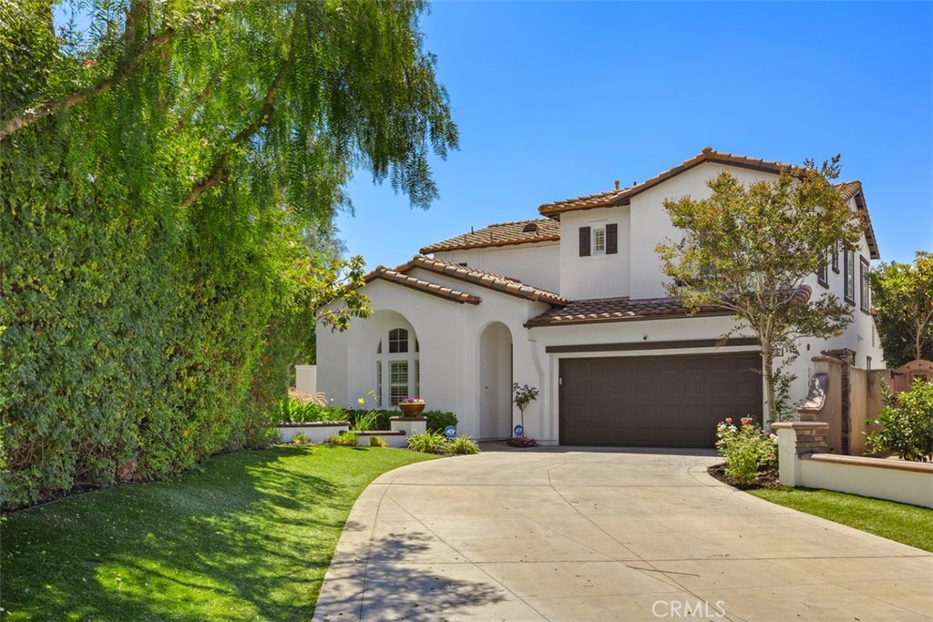 2 Via Paquete San Clemente, CA 92673 - Photo 44 of 44 a front view of a house with a garden and yard