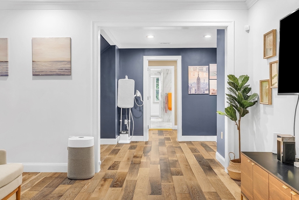 125 Union Street Natick, MA 01760 - Photo 17 of 38 a bathroom with a sink and a mirror