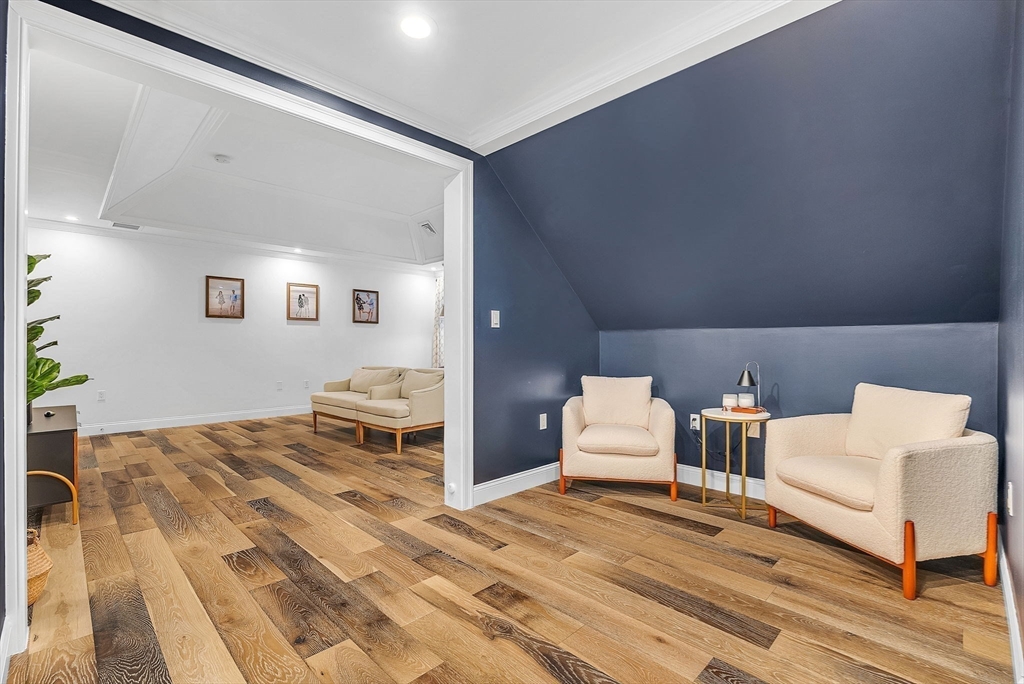 125 Union Street Natick, MA 01760 - Photo 19 of 38 a bedroom with a bed and a couch