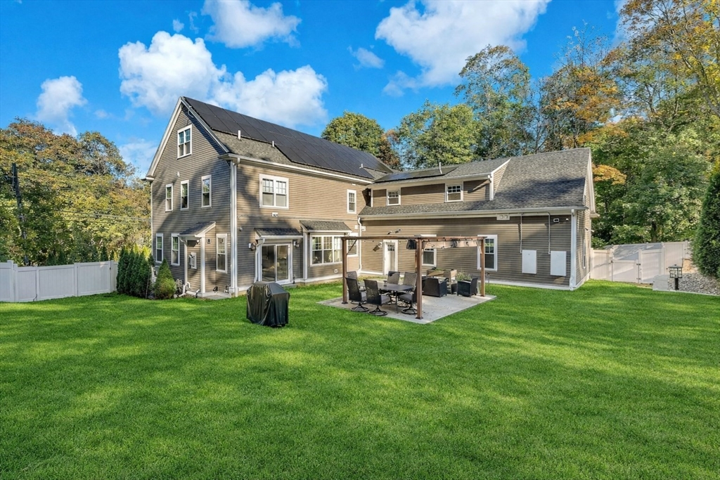 125 Union Street Natick, MA 01760 - Photo 38 of 38 a view of a house with sitting area and garden