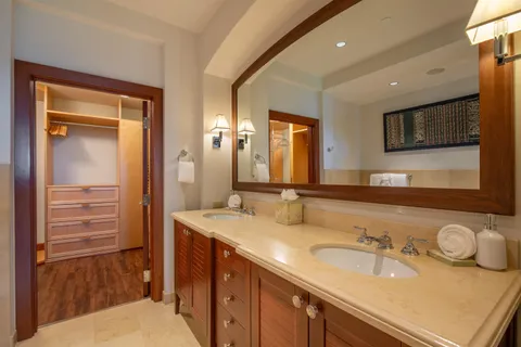 a room with furniture water view and a potted plant