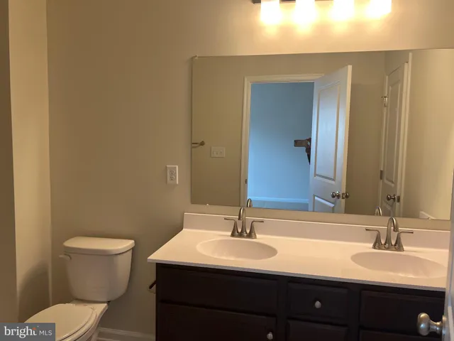 a bathroom with a sink and a toilet