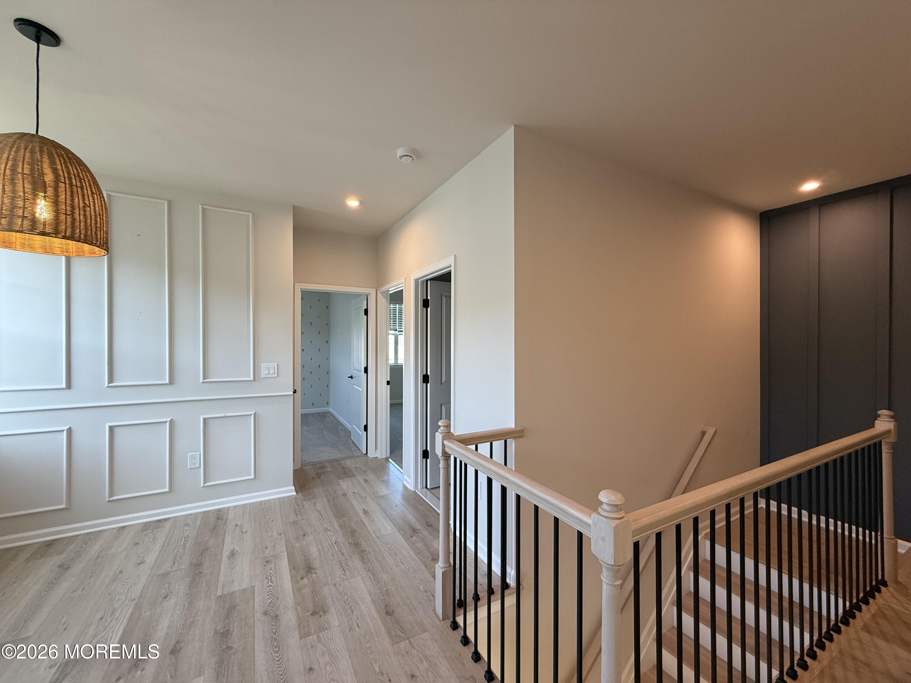20 Laird Way Neptune, NJ 07753 - Photo 20 of 32 a view of hallway with wooden floor