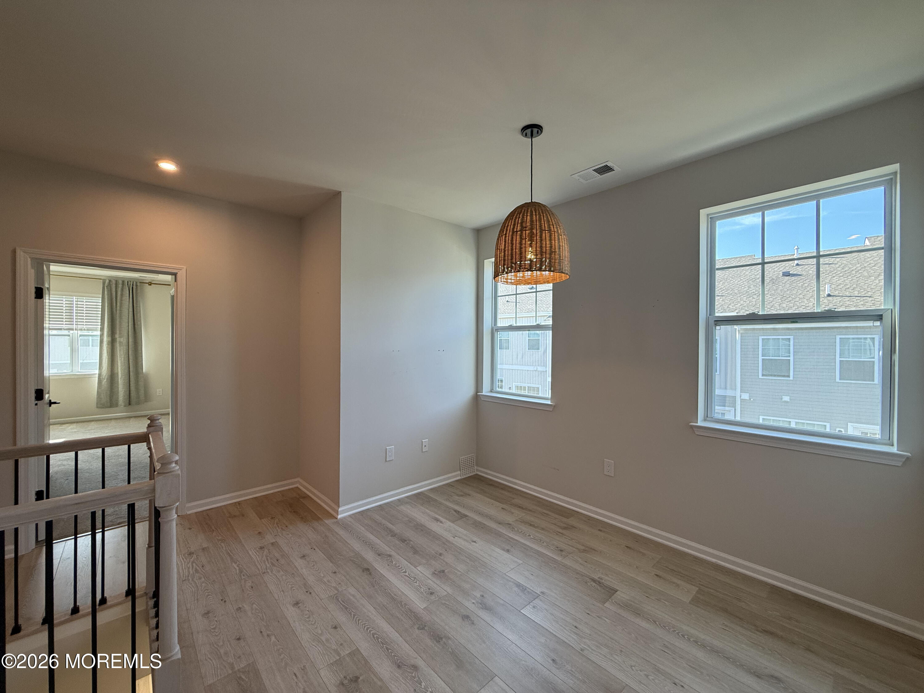 20 Laird Way Neptune, NJ 07753 - Photo 28 of 32 an empty room with windows
