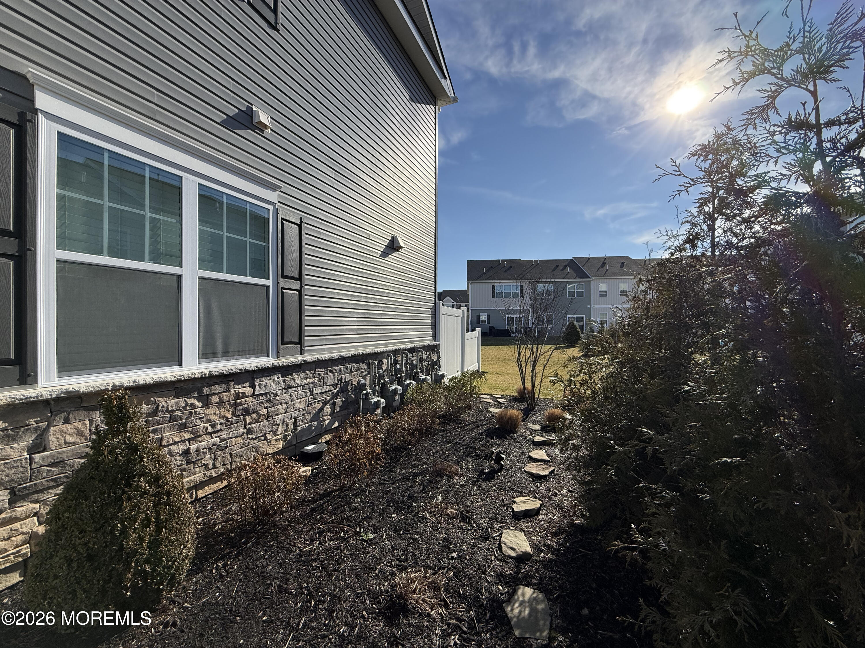 20 Laird Way Neptune, NJ 07753 - Photo 3 of 32 a view of a house with a small yard and large tree