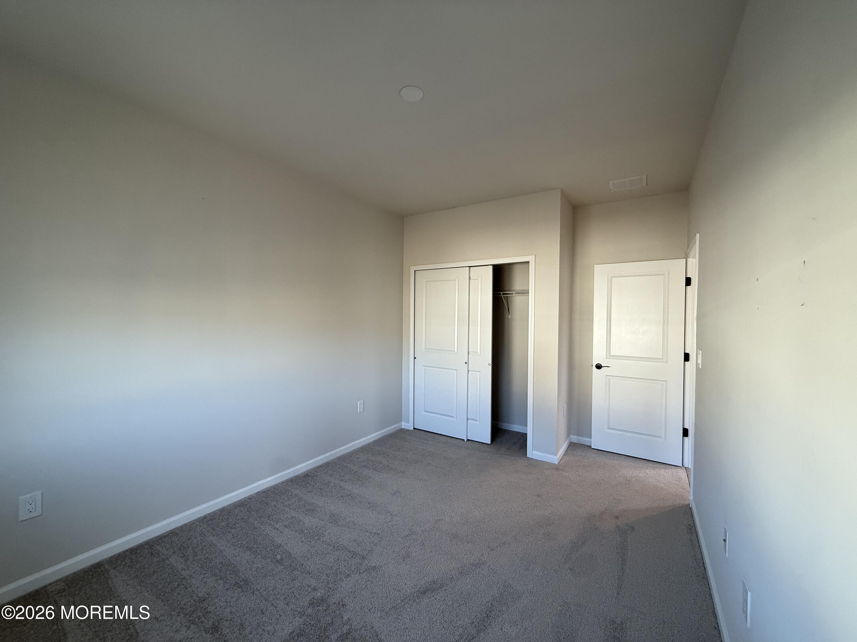 20 Laird Way Neptune, NJ 07753 - Photo 32 of 32 a view of an empty room and closet