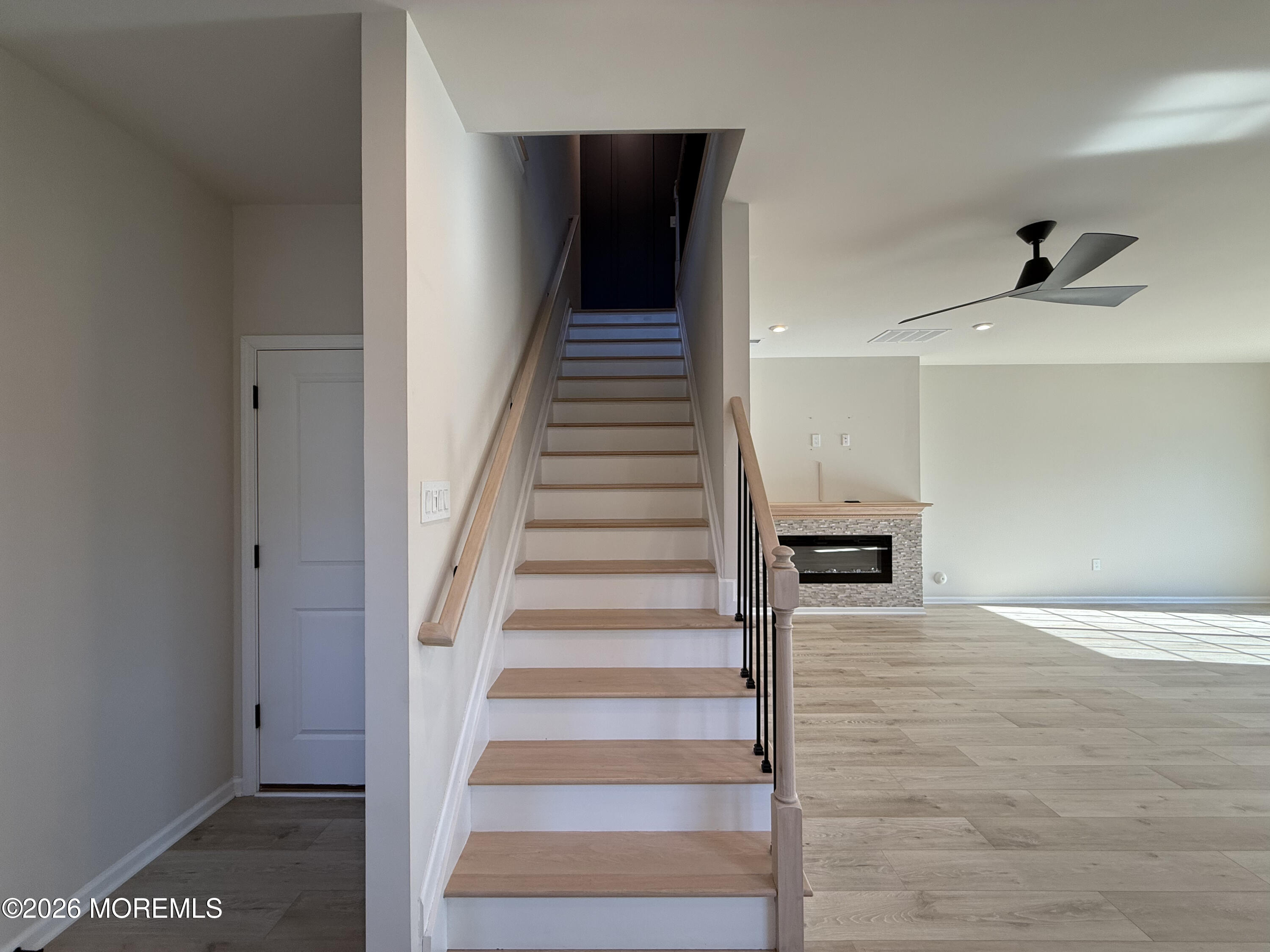 20 Laird Way Neptune, NJ 07753 - Photo 9 of 32 a view of staircase with white walls and windows