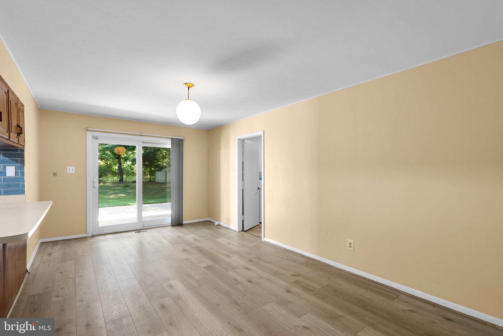 12306 Shadetree Lane Laurel, MD 20708 - Photo 14 of 55 eat in kitchen with walk out to back yard